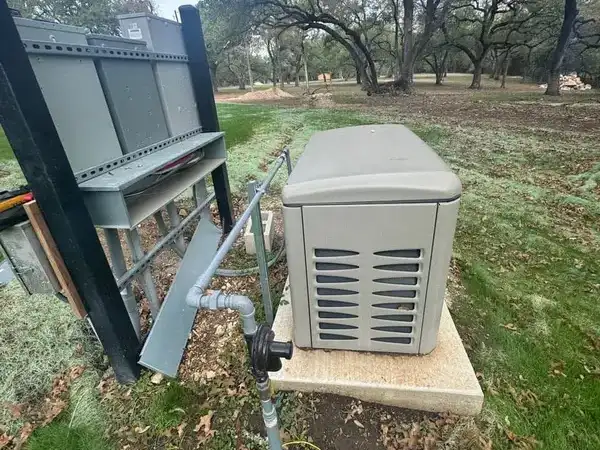 22kW Generac standby generator on concrete pad in Manchaca TX — installed by Cross Texas Electric
