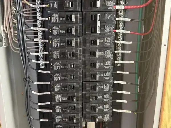 Residential panel upgrade in a Central Texas barndominium — labeled circuits and clean wire routing by Cross Texas Electric